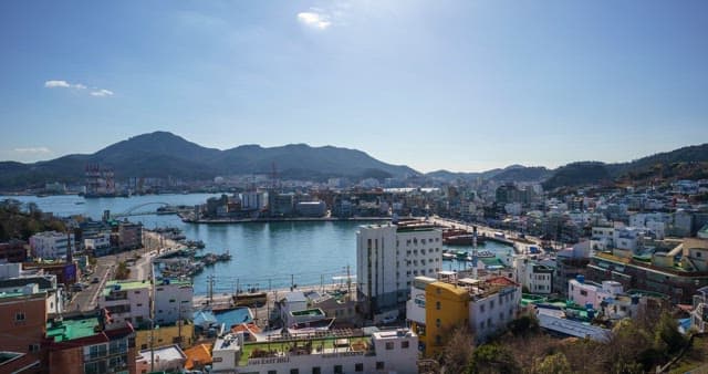 Scenery from day to night of a busy port city