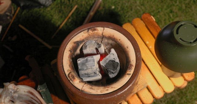 Preparing Squid on a Grill Outdoors