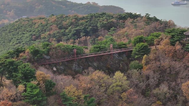 Sky Bridge Hanging Between Autumn Mountains