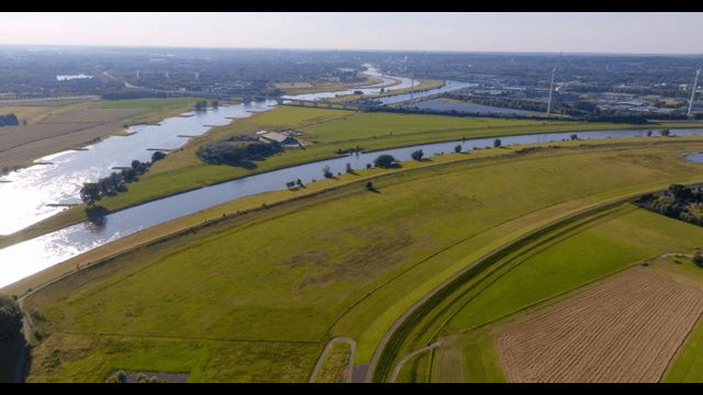 Aerial view of a river and farmland