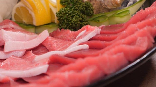 Fresh red tuna sashimi plated deliciously on a plate