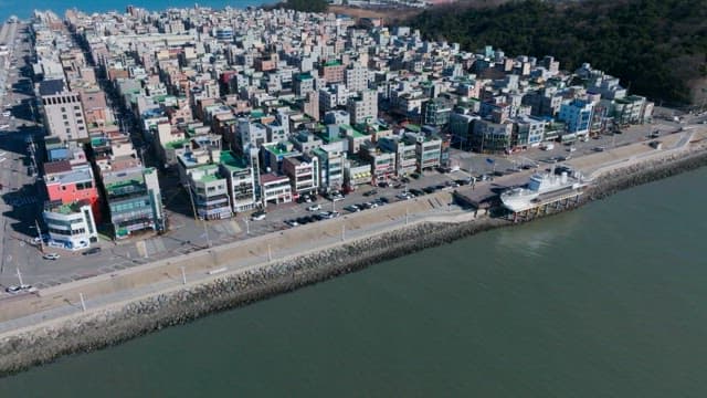 Coastal Cityscape with Urban Roads and Buildings