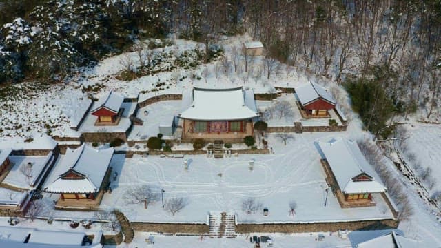 Traditional temple buildings covered in snow during winter