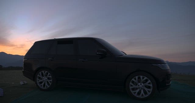 Vehicle Parked Against Twilight Sky