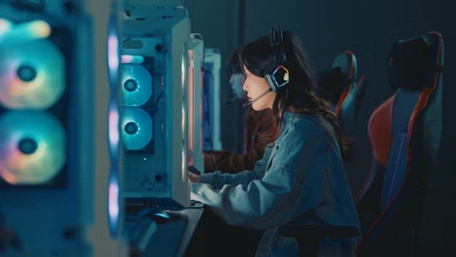 Focused Gamer Playing at a Gaming Setup