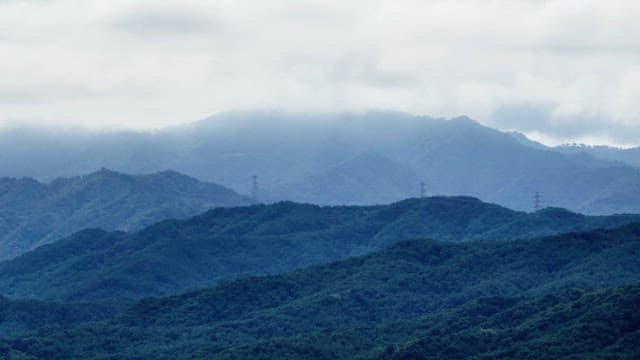 Clouds covering a mountain range