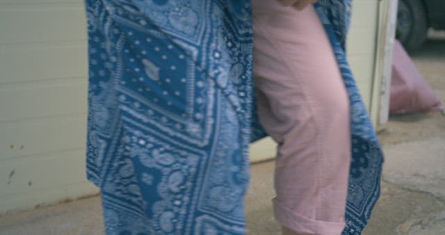 Woman Tying Her Untied Shoelaces Again