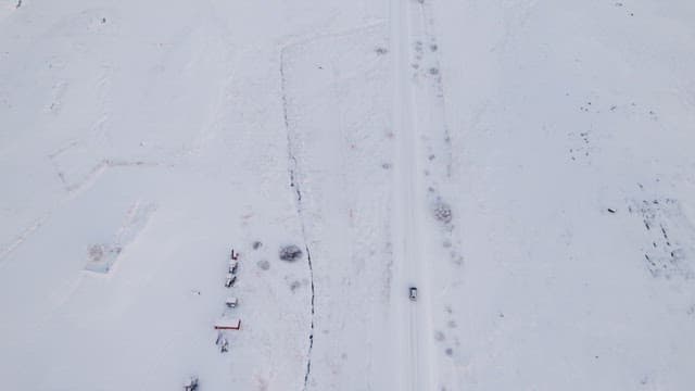 Car driving on a snowy road