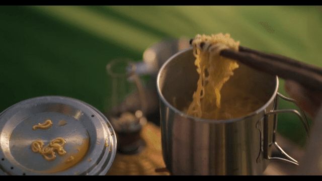 Eating Ramen from the Kettle Lid