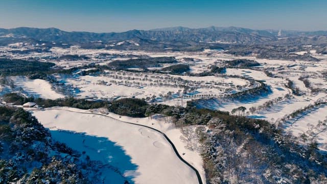 Serene Winter Landscape with Meandering River