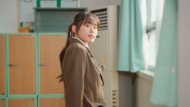 Student smiling in classroom