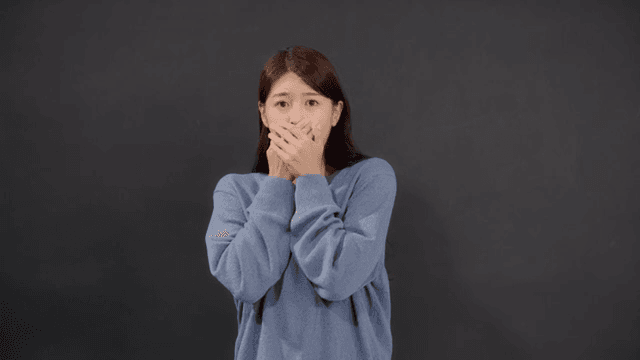 Woman expressing surprise and anxiety