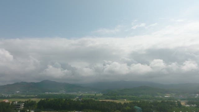 Beach pub with mountains in the background