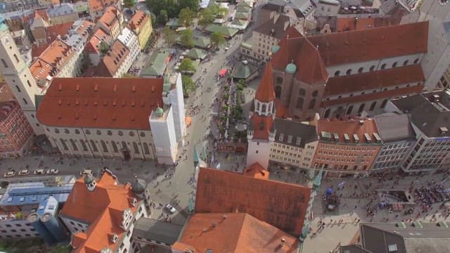 Square in Munich, europen city filled with people and buildings