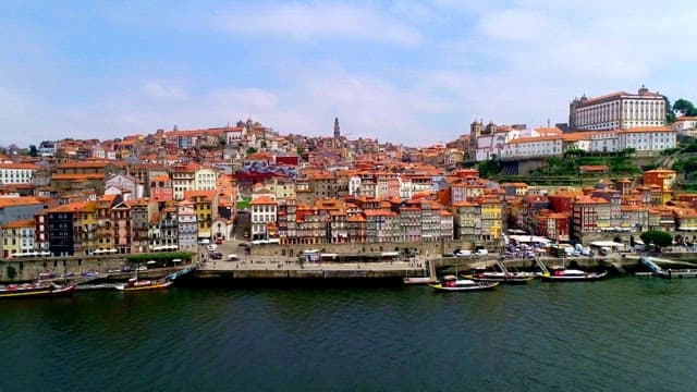 Aerial View of a Bustling Riverfront City, Oporto