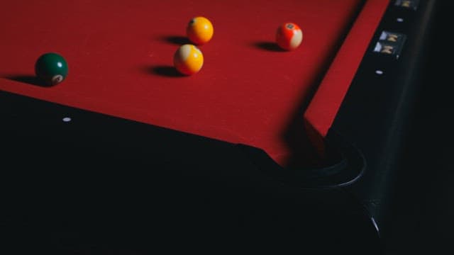 Pool balls on a billiard table