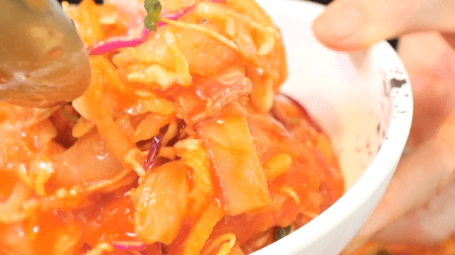 Appetizing cold raw fish soup served on an appetizer plate