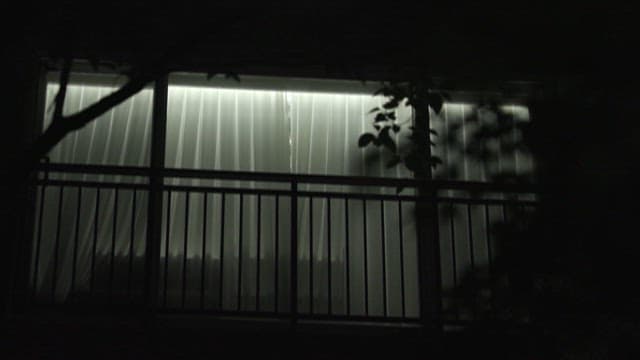 Mysterious night scene of urban balcony