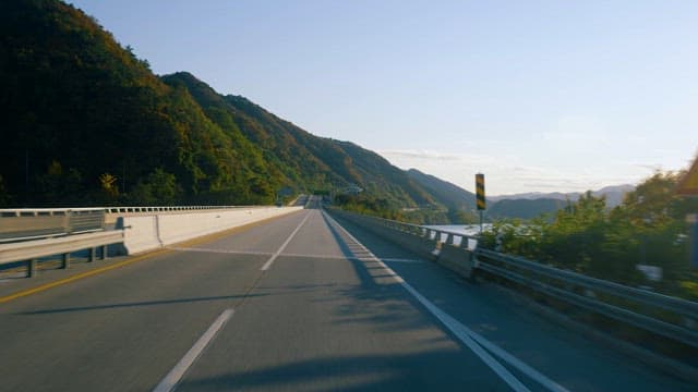 Scenic Drive Along a Lakeside Highway