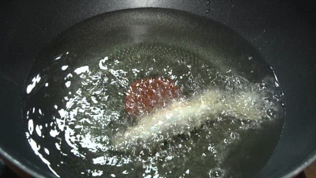 Frying Various Vegetables in Hot Oil 