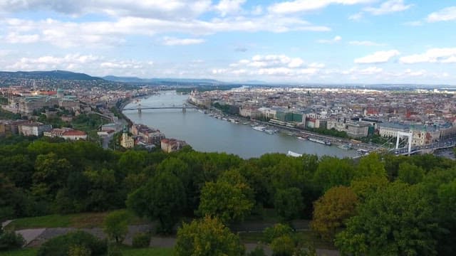 Scenic urban view with river and historical buildings