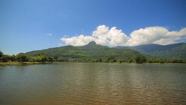 Tranquil lake with mountains in the background