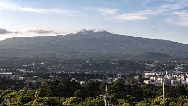 Cityscape with a mountain backdrop