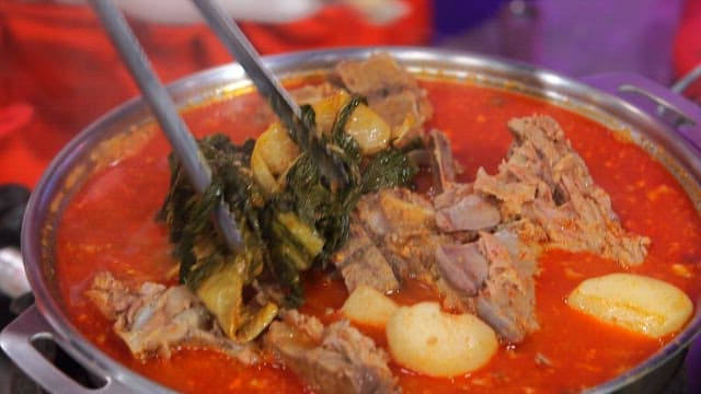 Spicy pork backbone stew with napa cabbage