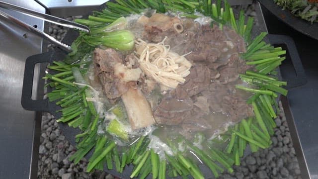 Hearty beef hot pot and spicy sea snails salad