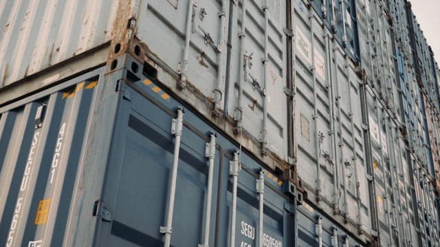Stacked Shipping Containers at a Port