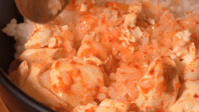 Spicy Soft Tofu Stew Served with a Bowl of Rice