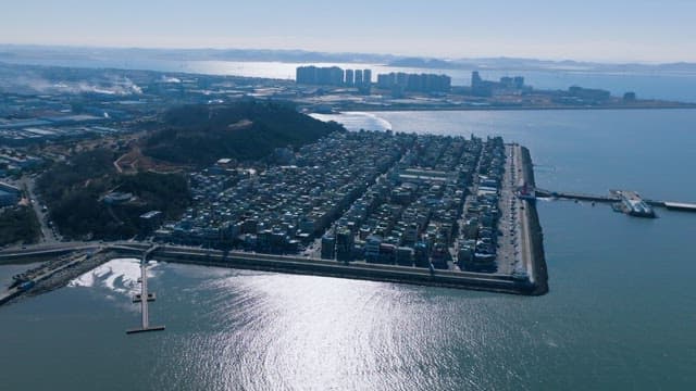 Coastal Cityscape with Industrial Backdrop