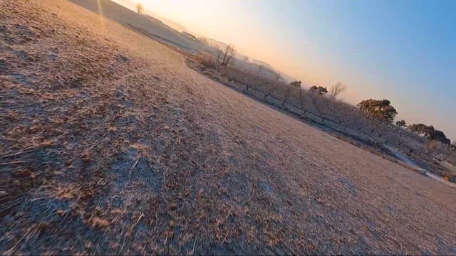 Sunrise over a serene rural landscape