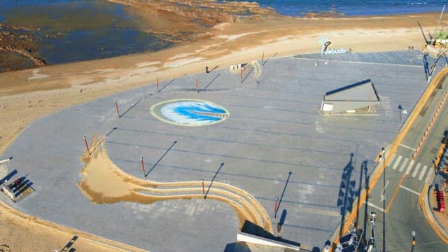 Quiet square and road near the beach in a coastal village