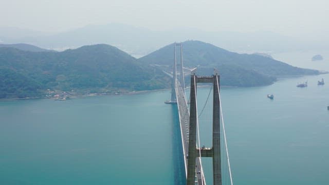 Large suspension bridge over calm sea