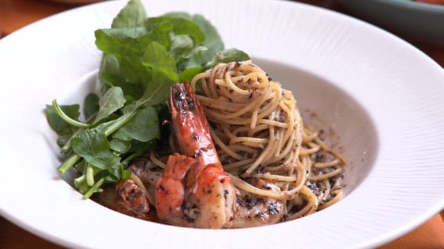 Gourmet Pasta and Salad on the Table