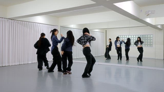 K-POP Dancers Practicing in a Studio