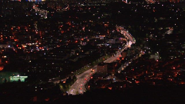Brightly Lit Night View of a Bustling City