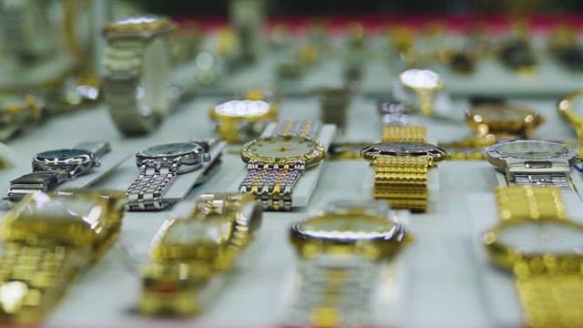 Assorted Timepieces Displayed on a Counter