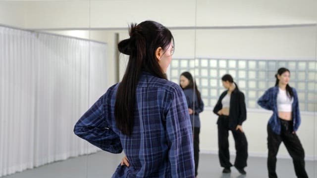 K-POP Dancers Practicing in a Studio