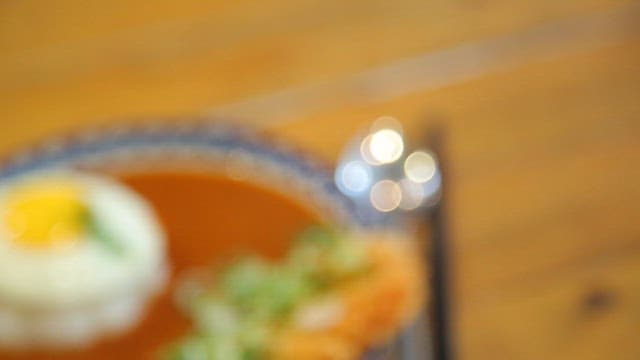 Plate of curry rice with fried cutlet