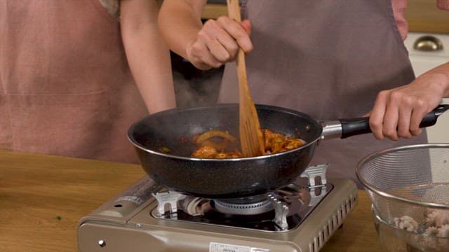 Stir-Fried Octopus Cooked on a Kitchen Gas Burner