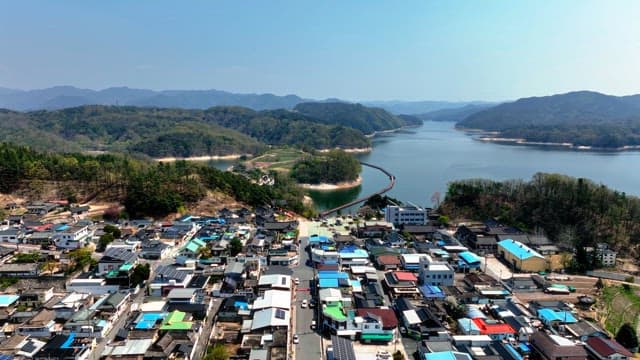 Scenic view of a lake with a rural village