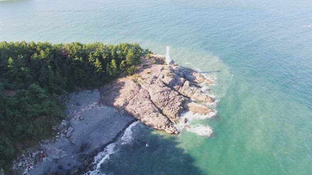 Lighthouse on a rocky coastline