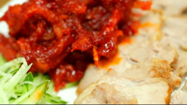 Sliced raw pollack salad with sliced boiled pork