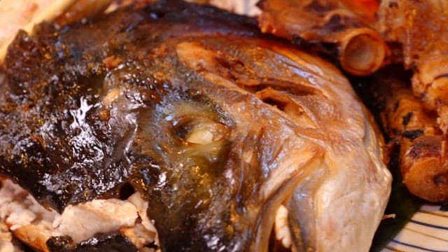 Grilled yellow tail served on a plate