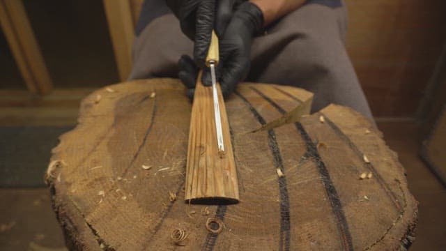 Wood carving with a chisel