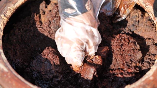 Aged soybean paste taken out of a crock pot