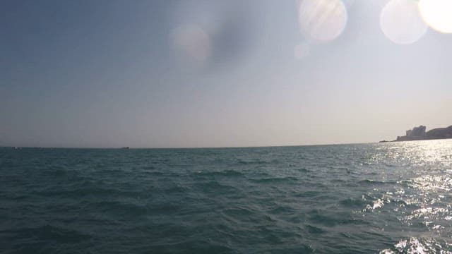 Seascape sparkling in the sunlight on a clear day