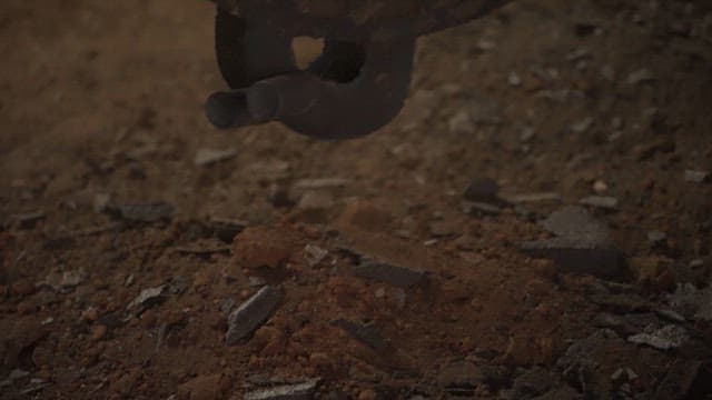 Dirt and metal pieces falling to the floor